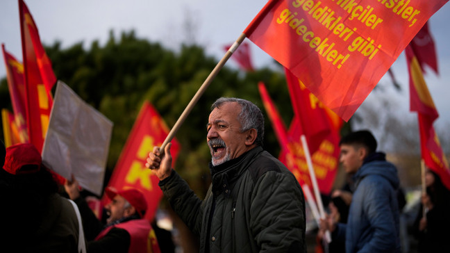 Turkish communist People's Liberation party supporters shout slogans during a small protest against U.S. State Secretary Anthony Blinken visit to Turkey, at Besiktas square in Istanbul, Turkey, Saturday, Jan. 6, 2024. (AP Photo/Francisco Seco)