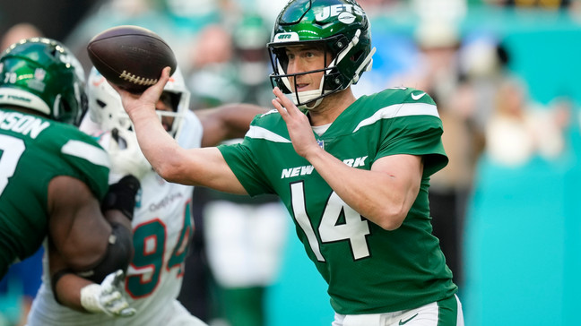 New York Jets quarterback Trevor Siemian (14) aims a pass during the second half of an NFL football game against the Miami Dolphins, Sunday, Dec. 17, 2023, in Miami Gardens, Fla. (AP Photo/Rebecca Blackwell)