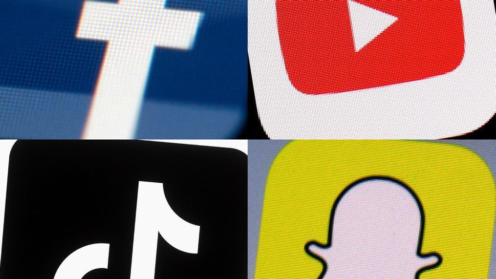 FILE - This combination of 2017-2022 photos shows the logos of Facebook, YouTube, TikTok and Snapchat on mobile devices. (AP Photo/File)