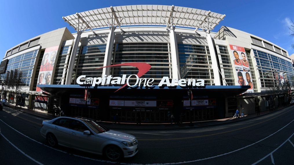 FILE - An exterior view of Capital One Arena is seen Saturday, March 16, 2019, in Washington. Capital One Arena is home to the Washington Capitals NHL hockey team and Washington Wizards NBA basketball team. A person with knowledge of the sale tells The Associated Press the Qatar Investment Authority is buying a 5% stake of the parent company of the NBA's Washington Wizards and NHL's Washington Capitals for $4.05 billion. It is believed to be the first time the government of Qatar is investing in North American professional sports.  (AP Photo/Nick Wass)
