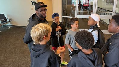 Image for story: Capitals host minority youth hockey academy