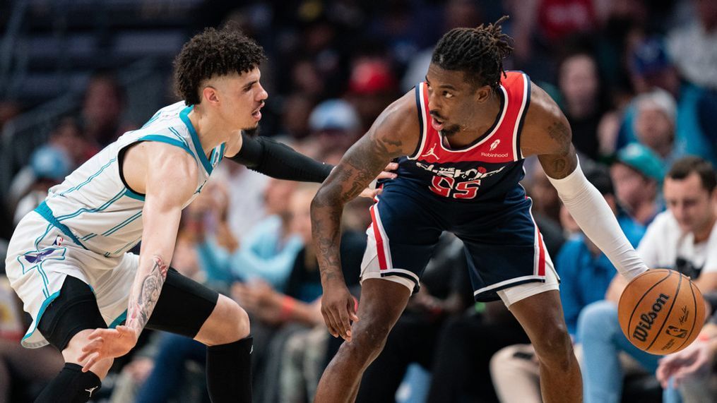 CHARLOTTE, NORTH CAROLINA - NOVEMBER 08: LaMelo Ball #1 of the Charlotte Hornets guards Delon Wright #55 of the Washington Wizards in the fourth quarter during their game at Spectrum Center on November 08, 2023 in Charlotte, North Carolina. NOTE TO USER: User expressly acknowledges and agrees that, by downloading and or using this photograph, User is consenting to the terms and conditions of the Getty Images License Agreement. (Photo by Jacob Kupferman/Getty Images)