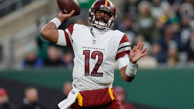 Washington Commanders quarterback Jacoby Brissett (12) passes against the New York Jets during the fourth quarter of an NFL football game, Sunday, Dec. 24, 2023, in East Rutherford, N.J. (AP Photo/Adam Hunger)