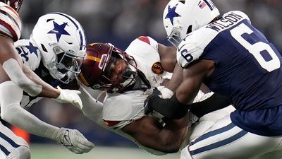 Image for story: Bland, Prescott help Cowboys to 13th straight home win over Commanders on Thanksgiving