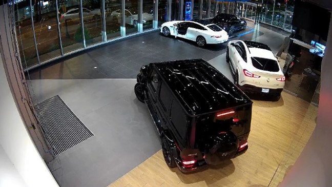 Thieves steal cars off the Bethesda showroom floor. (7News)